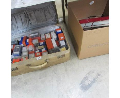 A mixed lot of old camera's, tripods, timer, backdrops etc and a case of slides