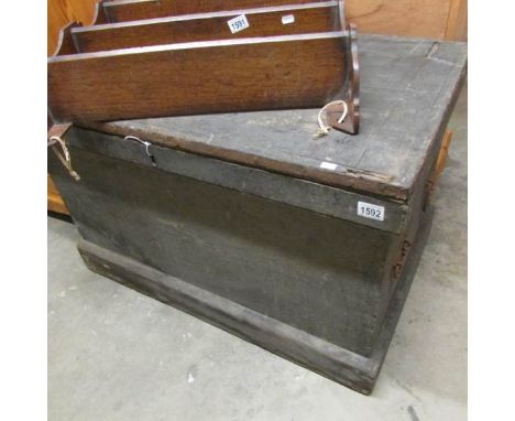 A wooden cabinet makers tool chest