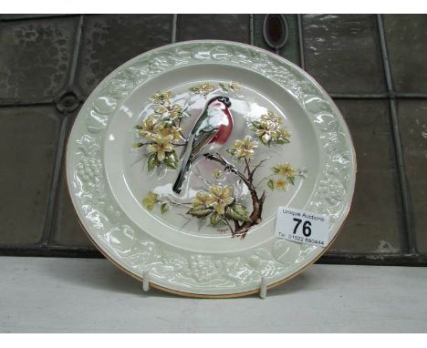 A Royal Worcester plate hand decorated with a Bullfinch