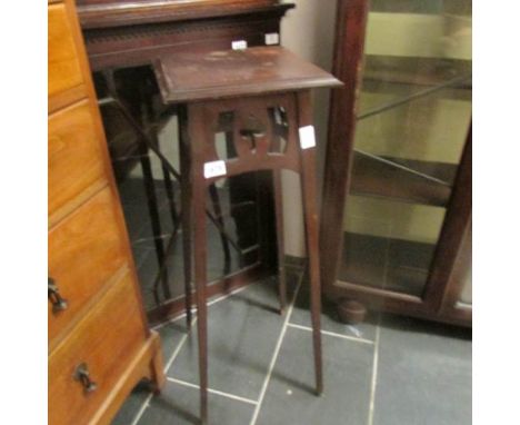 A mahogany plant stand