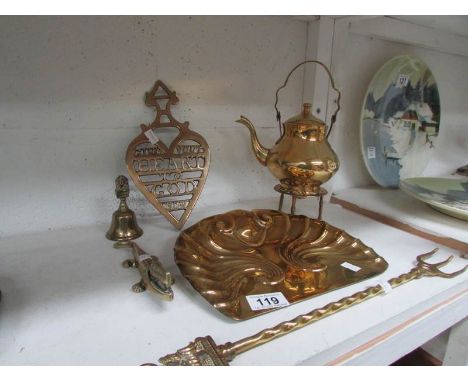 A brass crunb tray, toasting fork, trivet, nut crackers, kettle etc