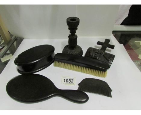 A mixed lot including candlestick, brushes, mirror, comb etc