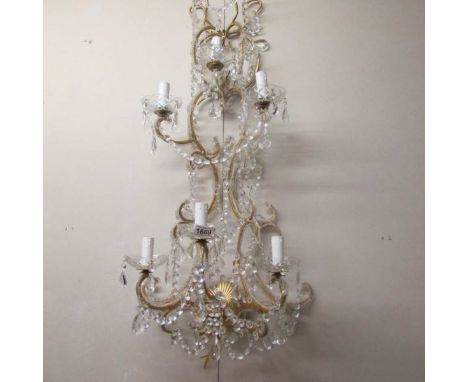 A 6 lamp chandelier style wall light