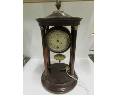 A four pillar clock with enamel dial