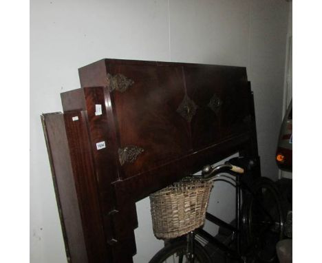 A 1930's wooden fire surround with cabinet top