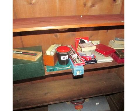A mixed lot including playing cards, dice, dominoes, cribbage boards etc