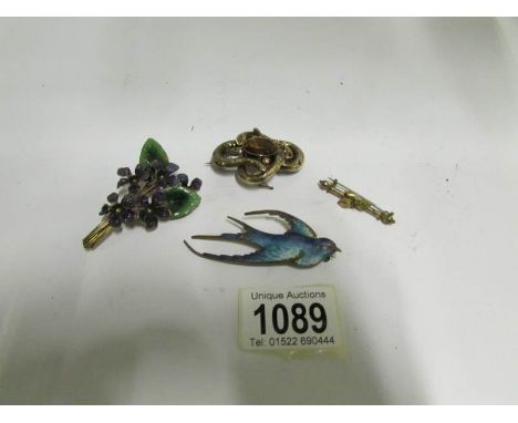 A Enamel 'Swallow' brooch, a Victorian brooch and 2 others