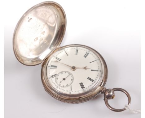 A Victorian silver cased full hunter gents pocket watch having an unsigned white enamel dial, subsidiary seconds dial, keywin