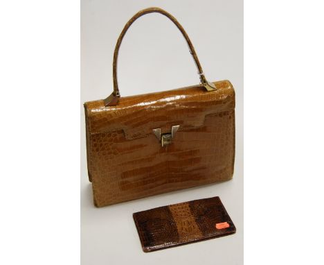 A ladies vintage crocodile skin handbag together with a vintage snakeskin wallet (2).Handbag – quite well used, handle worn a
