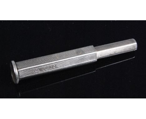 A mid-20th century 9ct gold cigar punch, of hexagonal form, having engine turned decoration, maker S.J. Rose &amp; Son, Londo