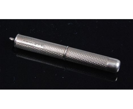 A mid-20th century 9ct gold propelling cigar piercer, having engine turned decoration, maker S.J. Rose &amp; Son, Birmingham,