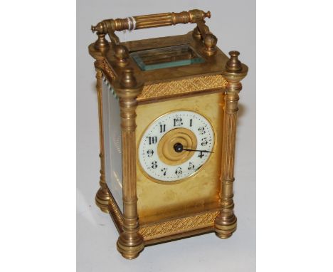 A late 19th century gilt brass cased carriage clock (lacking glass door and one side panel) height 13.5cm