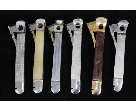 A continental steel cigar cutter, having engine turned decoration with cutter to one end and box opener to the opposing end; 