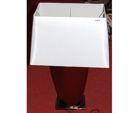 A large contemporary table lamp, having spot-hammered type finish, with rectangular silk shade, h.86cm