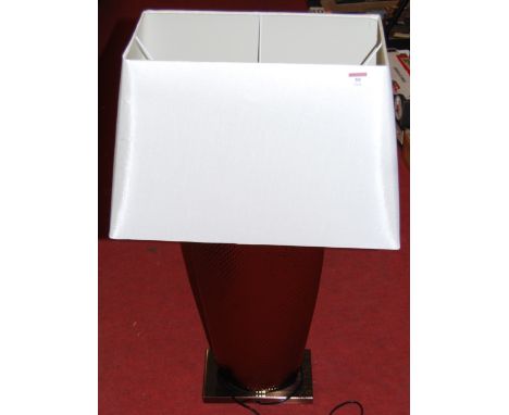 A large contemporary table lamp, having spot-hammered type finish, with rectangular silk shade, h.86cm