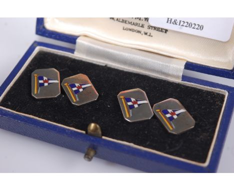 A cased pair of silver and enamel set nautical gent's cufflinks, retailed by Captain O.M. Watts Ltd of Albemarle Street, Lond