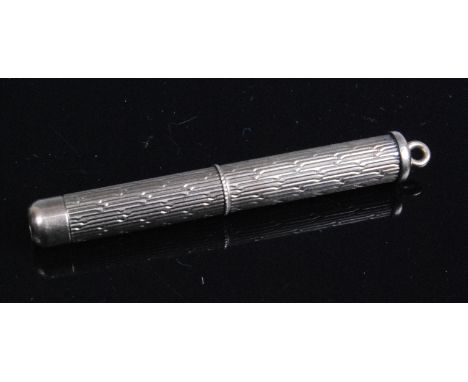 A 1970s 9ct gold propelling cigar piercer, having engine turned decoration, maker Joshua Houghton &amp; Son, Birmingham, gros