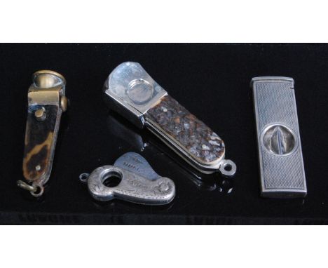 A 1970s silver pocket guillotine cigar cutter having engine turned decoration, maker's mark rubbed, together with a horn hand