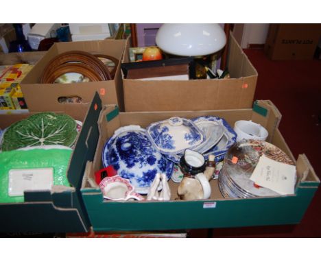 Four boxes of various mixed effects to include brass paraffin lamp, various collectors plates, blue &amp; white tea and dinne