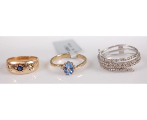 A 9ct gold gypsy style sapphire and old cut diamond set ring, size I, together with a contemporary far eastern 9ct gold blue 