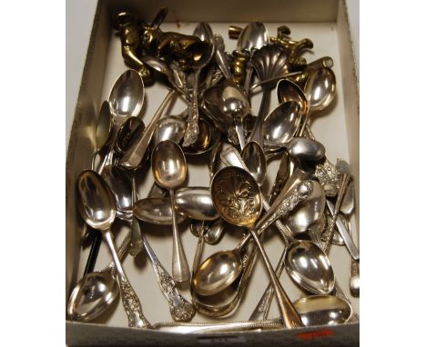 A collection of principally silver flatwares being various teaspoons, sugar bows, caddy spoon, etc, in various patterns, toge