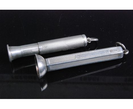 A mid-20th century Dunhill cigar punch, of hexagonal form, having engine turned decoration, Birmingham 1958; together with a 