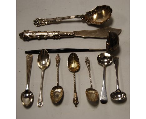 Assorted silver flatwares to include a Georgian toddy ladle with whalebone handle, various tea and caddy spoons, butter knife