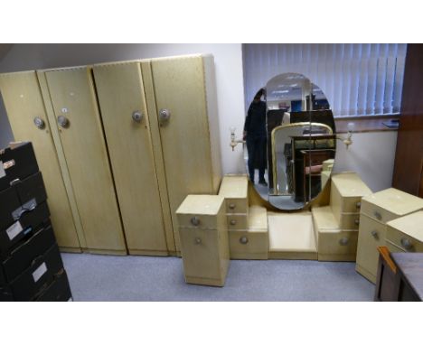 Mid Century limed oak bedroom suite comprising of two 2 door wardrobes with traditional English patterned embroidered handles