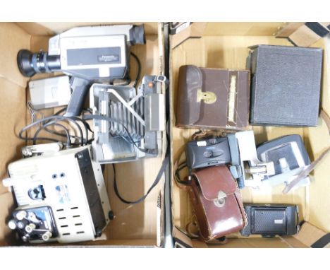 A collection of vintage camera and movie equipment including projector, Polaroid 220 land camera etc (2trays) 