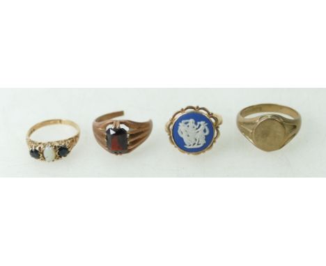 Four x 9ct gold rings - Gents signet T1/2, Wedgwood set M, blue stone &amp; opal (damaged) M and Garnet missing section of sh