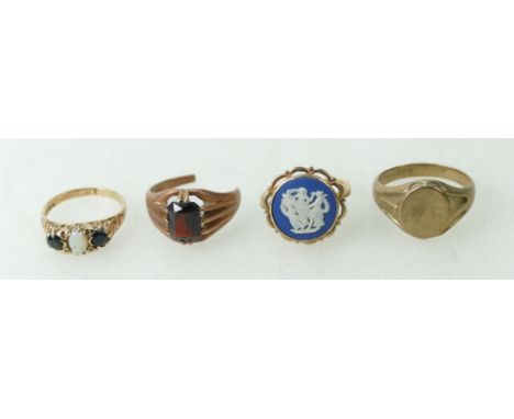 Four x 9ct gold rings - Gents signet T1/2, Wedgwood set M, blue stone &amp; opal (damaged) M and Garnet missing section of sh