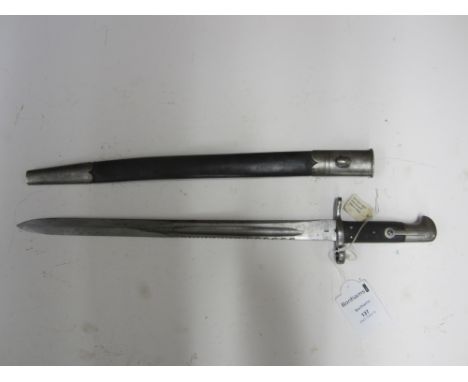 A Martini Henry 1875 Sawback Pattern Bayonet,the hilt impressed FF 14 and the scabbard marked 84. (1)