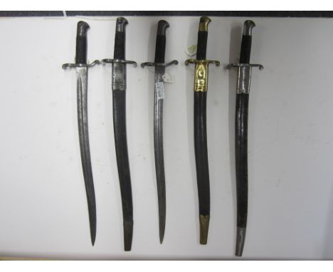 A British Martini Henry Bayonet,1856/58, in scabbard (2), with a Volunteer version with brass pommel and brass mounted scabba