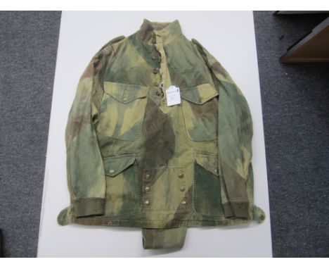 A WW2 British Army Denison Smock,the half zip replaced with an unusual button and loop fixing, complete with woolen cuffs and