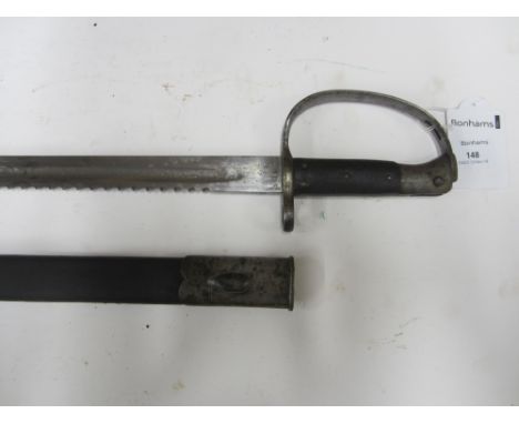 An 1879 Pattern Martini Henry Artillery sawback bayonet,with 65.5cm blade, with various War Department stamps, dated 1/84, in