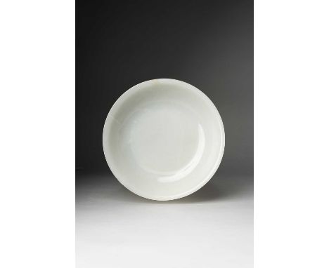 A LARGE CHINESE WHITE JADE SHALLOW BOWLQIANLONG 1736-95The rounded sides rising to a gently flared rim above a short straight