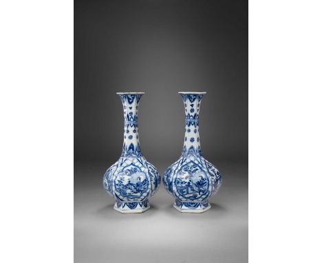 A RARE PAIR OF CHINESE BLUE AND WHITE 'G' MARKED 'LADIES' BOTTLE VASESKANGXI 1662-1722Each of hexagonal section, painted with