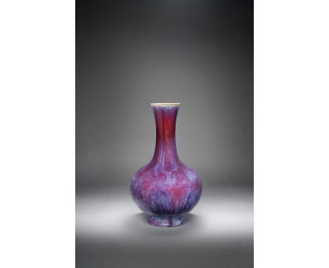 A RARE AND FINE CHINESE IMPERIAL FLAMBE-GLAZED BOTTLE VASESIX-CHARACTER QIANLONG SEAL MARK AND OF THE PERIOD 1736-95The globu