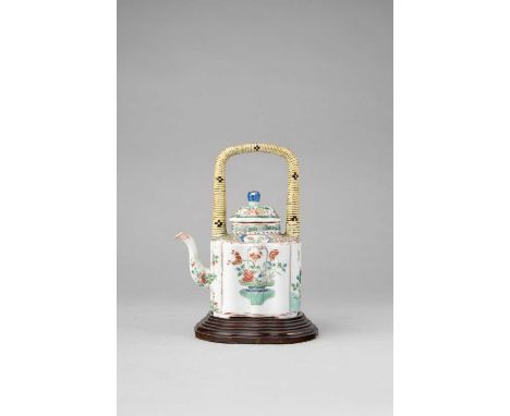 A CHINESE FAMILLE VERTE EWER AND COVERKANGXI 1662-1722The body of shaped rectangular form below a bail handle, decorated to t
