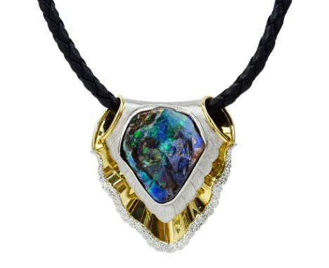 Large Black Opal, Platinum and 18 Karat Yellow Gold Pendant Necklace accented with Round Brilliant Cut Diamonds and suspended