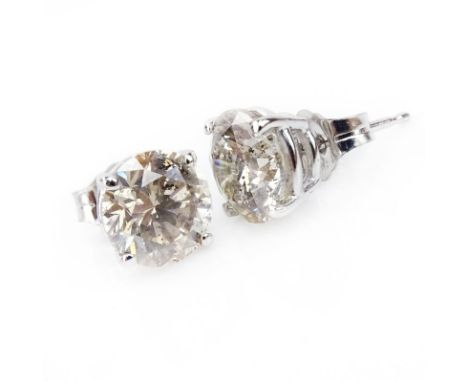 Approx. 3.09 Carat Round Brilliant Cut Diamond and 14 Karat White Gold Ear Studs. Diamonds SI3 clarity, J-K color. Good condi