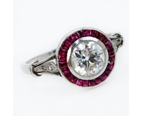 Art Deco Approx. .80 Carat European Cut Diamond, Caliber Cut Ruby and Platinum Engagement Ring. Diamond. Diamond H color, VS2