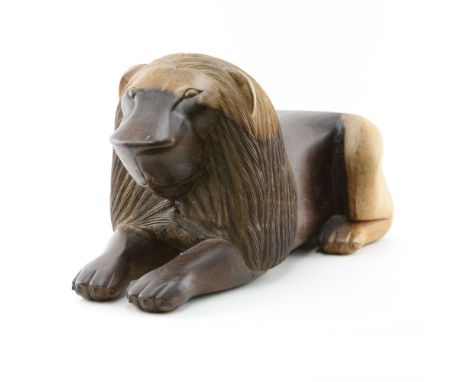 Antonio Juliao, Brazilian (20th Century) Folk Art Wood Carving of a  Jacaranda Lion. Signed on underside, dated 1992. Some ru