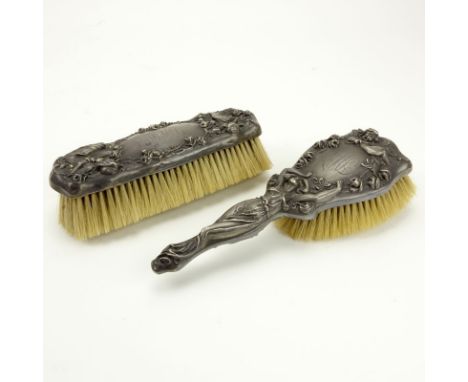 Two (2) Art Nouveau Period Sterling Silver Brushes. Signed Sterling. Minor dings or in good condition. Measures 8-1/2" L and 