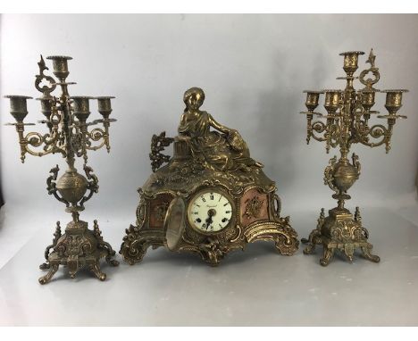 German Imperial Brass mantle clock with Candelabra Garnitures and ceramic inserts (A/F)