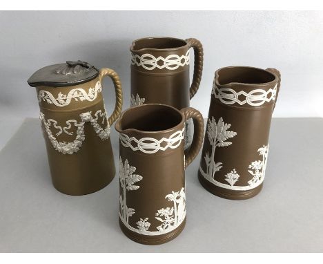 Collection of four Wedgewood Brown and white Jasperware jugs with rope effect handles