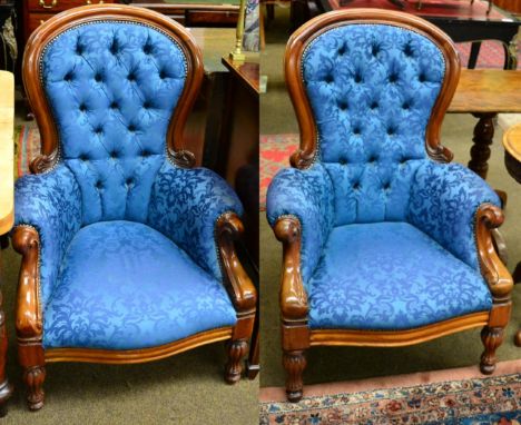 A pair of reproduction mahogany framed button back armchairs 