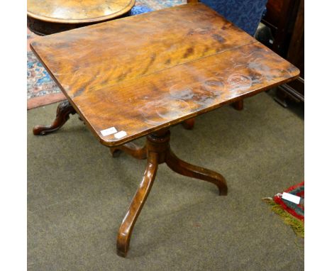 A 19th century tripod table 