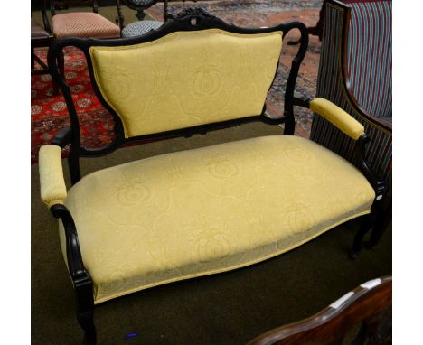 A 19th century ebonised sofa 