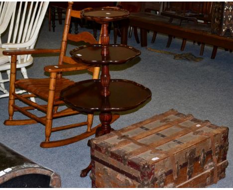 An American ladderback rocking chair; together with a Georgian style mahogany dumb waiter by Mersman and a 19th century trave